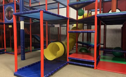 Colourful indoor play structure at Kid City